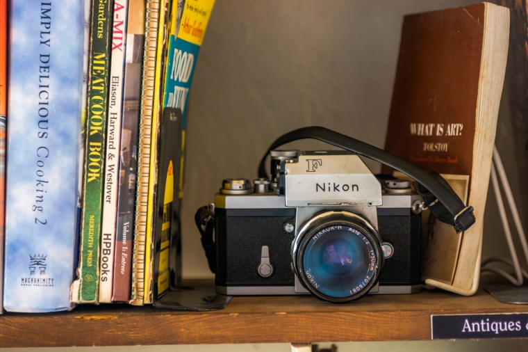 Film Camera on Bookshelf